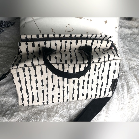 Gorgeous RSD Ivy in ink bleed, black leather, and plum plumes lining. - Picture 1 of 3